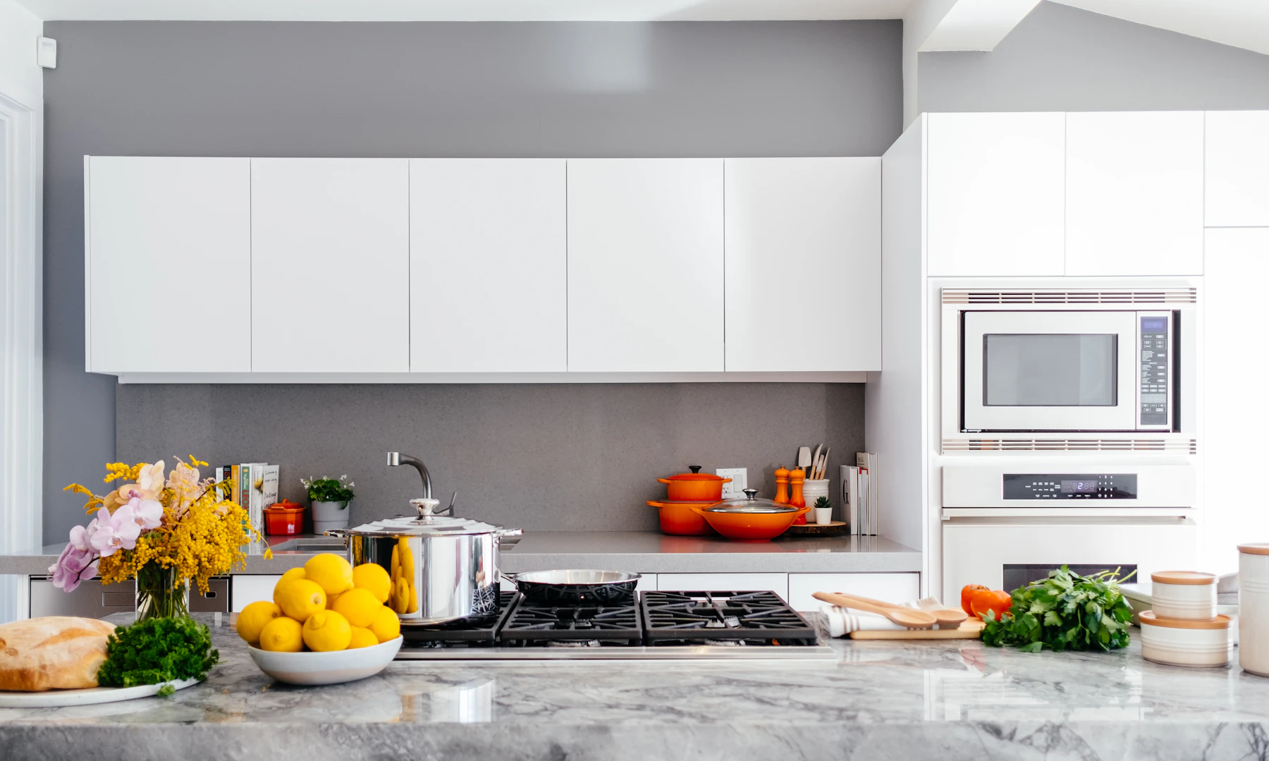 White kitchen finish reference with a broad stone worktop
